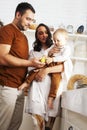 Young family with little cute son on kitchen in morning happy smiling, lifestyle people concept