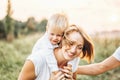 Young family with little son have fun outdoor