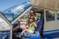 A young family mother and daughter in the cabin of a light aircraft Royalty Free Stock Photo