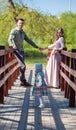 Young family, mother, father, daughter, walk in the city park Royalty Free Stock Photo