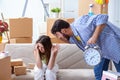 The young family moving to new apartment Royalty Free Stock Photo