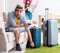 Young family packing for vacation travel Royalty Free Stock Photo