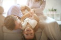 Young family playing at home. Royalty Free Stock Photo