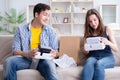 Young family playing games with virtual reality glasses Royalty Free Stock Photo