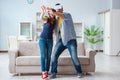 The young family playing games with virtual reality glasses Royalty Free Stock Photo