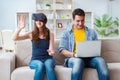 The young family playing games with virtual reality glasses Royalty Free Stock Photo