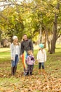 Young family playing with a kite Royalty Free Stock Photo