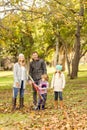 Young family playing with a kite Royalty Free Stock Photo