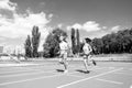 Young family promoting healthy lifestyle. Woman and man run stadium. Couple runners training outdoors. Couple or family Royalty Free Stock Photo