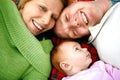 Young family on rug