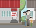 Young family with for sale house. Royalty Free Stock Photo