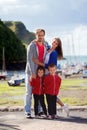 Young family with small kids on a harbor in the afternoon Royalty Free Stock Photo