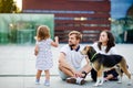 Young family spending a day off in the city park.