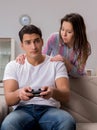 Young family suffering from computer games addiction