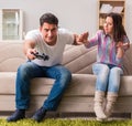 Young family suffering from computer games addiction