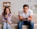 Young family suffering from computer games addiction