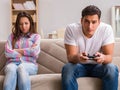 Young family suffering from computer games addiction