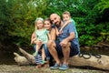 Young family with their pet dog, golden retriever Royalty Free Stock Photo