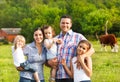 Young family with three children on the farm Royalty Free Stock Photo