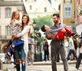 Young family with two kids walking street old tourist city Royalty Free Stock Photo