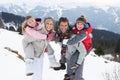 Young Family On Winter Vacation