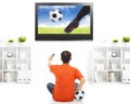 Young fan watching soccer game at home Royalty Free Stock Photo