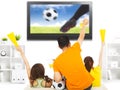 Young fans watching soccer game and yell at home Royalty Free Stock Photo