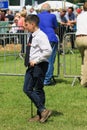 A young farmer boy at a county show