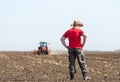 Young farmer on farmland Royalty Free Stock Photo