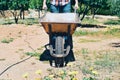 Young farmer man pushing a wheelbarrow Royalty Free Stock Photo