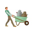 Young farmer man use wheelbarrow to take milk barrels