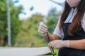 Young farmers are monitoring the hydroponic water system and nutrients in order to control the quality of organic vegetables to