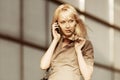 Young fashion business woman calling on cell phone Royalty Free Stock Photo