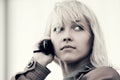 Young fashion blond business woman talking on cell phone outdoor Royalty Free Stock Photo