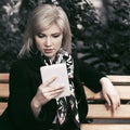 Young fashion blond business woman using digital tablet computer Royalty Free Stock Photo