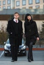 Young fashion business couple on city street Royalty Free Stock Photo