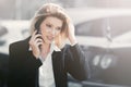 Young fashion business woman calling on cell phone in city street Royalty Free Stock Photo