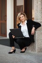 Young fashion business woman with laptop Royalty Free Stock Photo