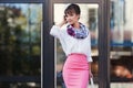 Young fashion business woman in white shirt and pink pencil skirt Royalty Free Stock Photo