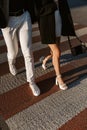 Close up man and woman legs on the crosswalk Royalty Free Stock Photo