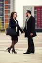 Young fashion couple in love walking on city street Royalty Free Stock Photo