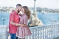 Young fashion couple of lovers at beginning of love story - Handsome man whispers kisses in pretty woman ear - Royalty Free Stock Photo