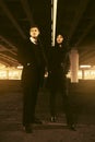 Young fashion couple under highway road intersection