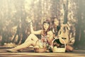 Young fashion girls with fruit baskets in summer forest Royalty Free Stock Photo