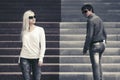 Young fashion couple flirting in city street Royalty Free Stock Photo