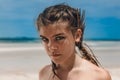 Young fashion model outdoors portrait with feather cuff