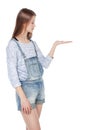 Young fashion teenage girl looking on her palm isolated Royalty Free Stock Photo