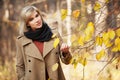 Young fashion woman walking in autumn forest Royalty Free Stock Photo