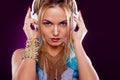 Young fashionable girl in disco style. Listening music and enjoying. Retro style Royalty Free Stock Photo
