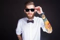 Young fashionable hipster man in white shirt Royalty Free Stock Photo